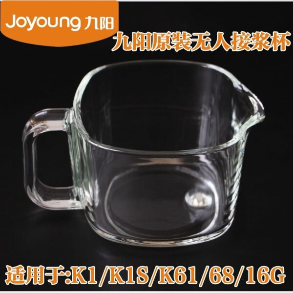 A glass measuring cup with handle is shown.