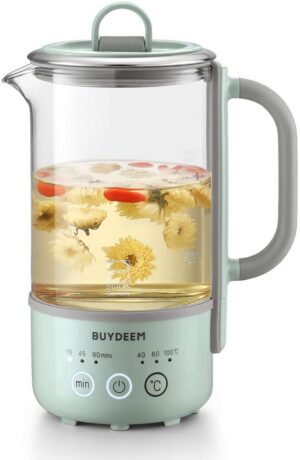 Electric tea kettle with flowers infusing.