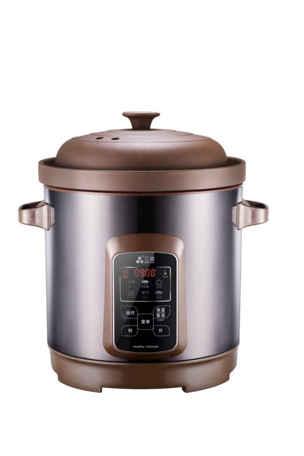 Digital slow cooker with brown lid.