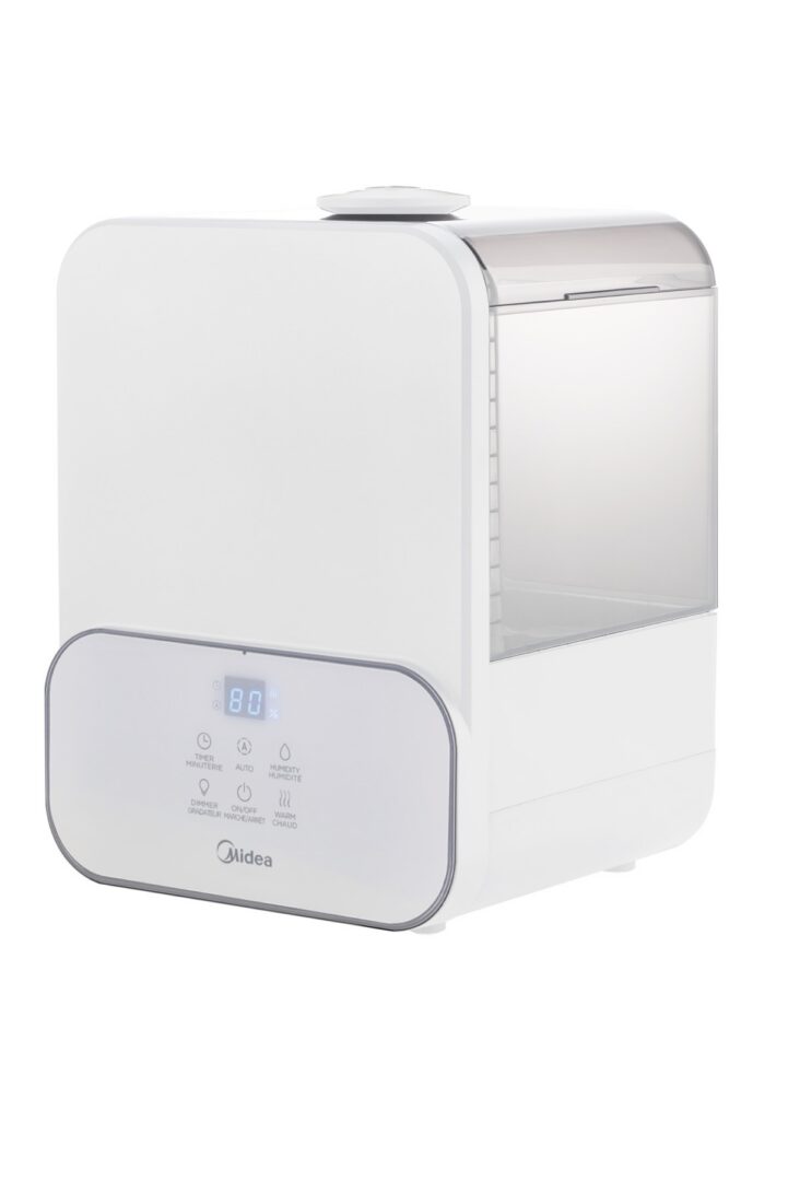 Angled view of the white Midea SCK-3Q60B humidifier and water tank