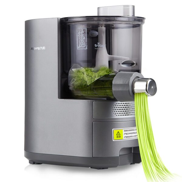 Gray electric pasta maker with green noodles.