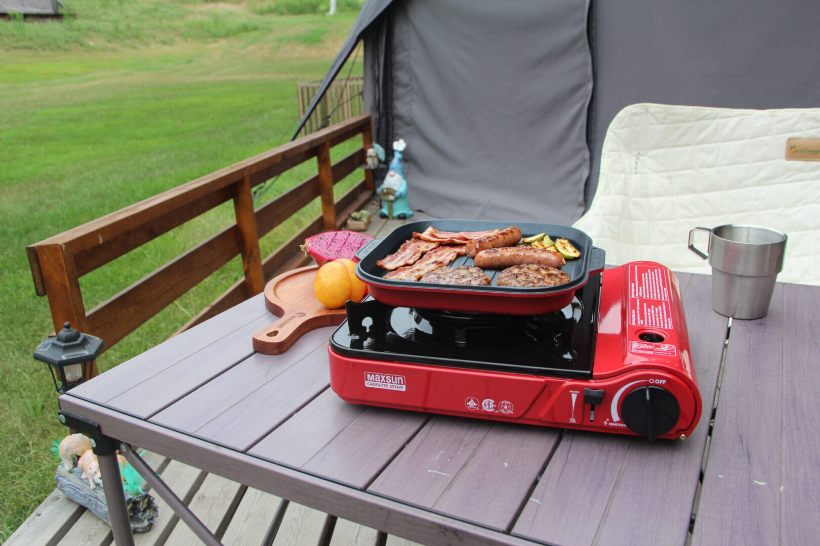 Red Maxsun MS-3800 butane cassette stove used for outdoor cooking