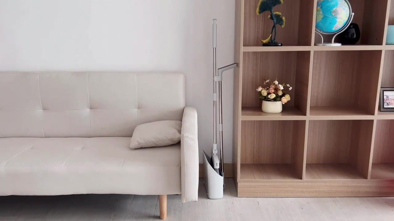 Q10 set folded upright beside a sofa and shelf