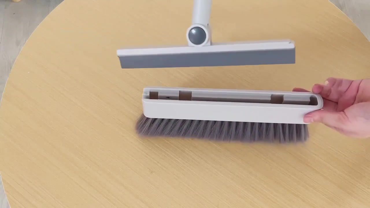 Broom bristle section removed to reveal the Q10 squeegee